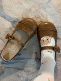 Mary-Flats mit rundem Zehenbereich und leicht gewelltem Saum - Braun