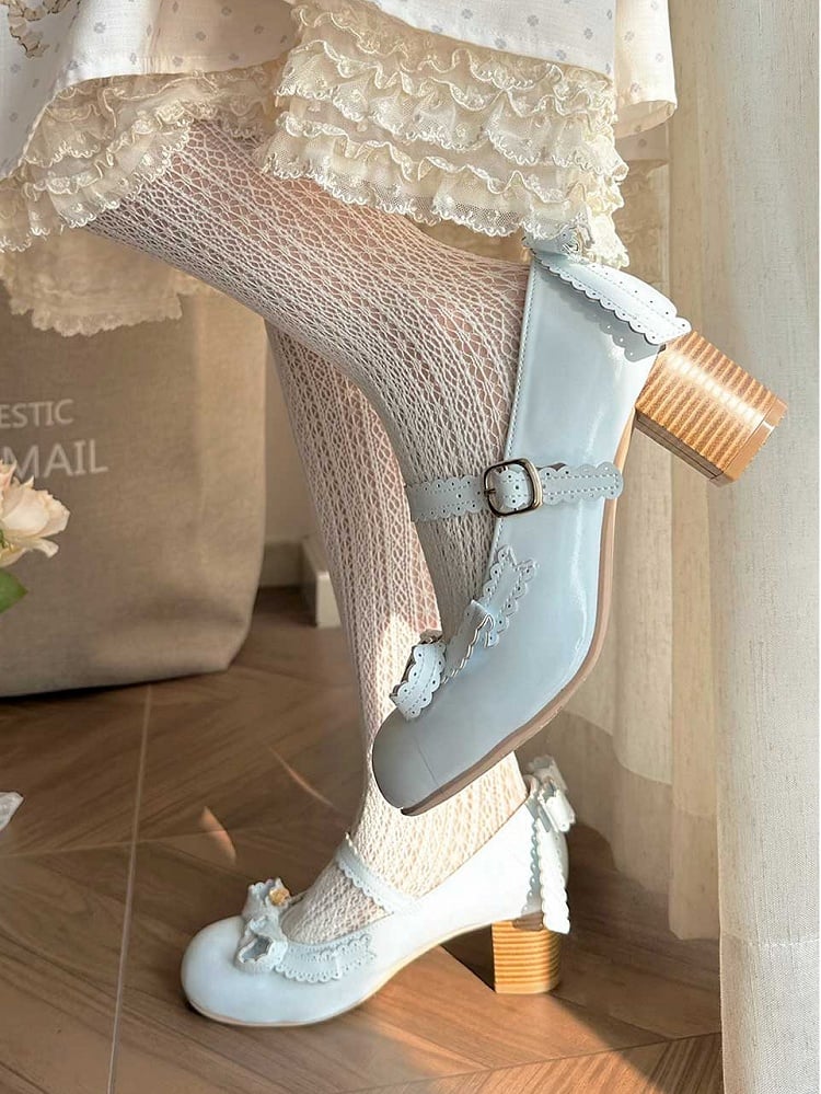 Janes Schleife verziert Mary Blue Top Herz bei
