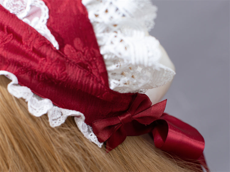 Spitzenbesatz mit Schleife in Weiß und Weinrot