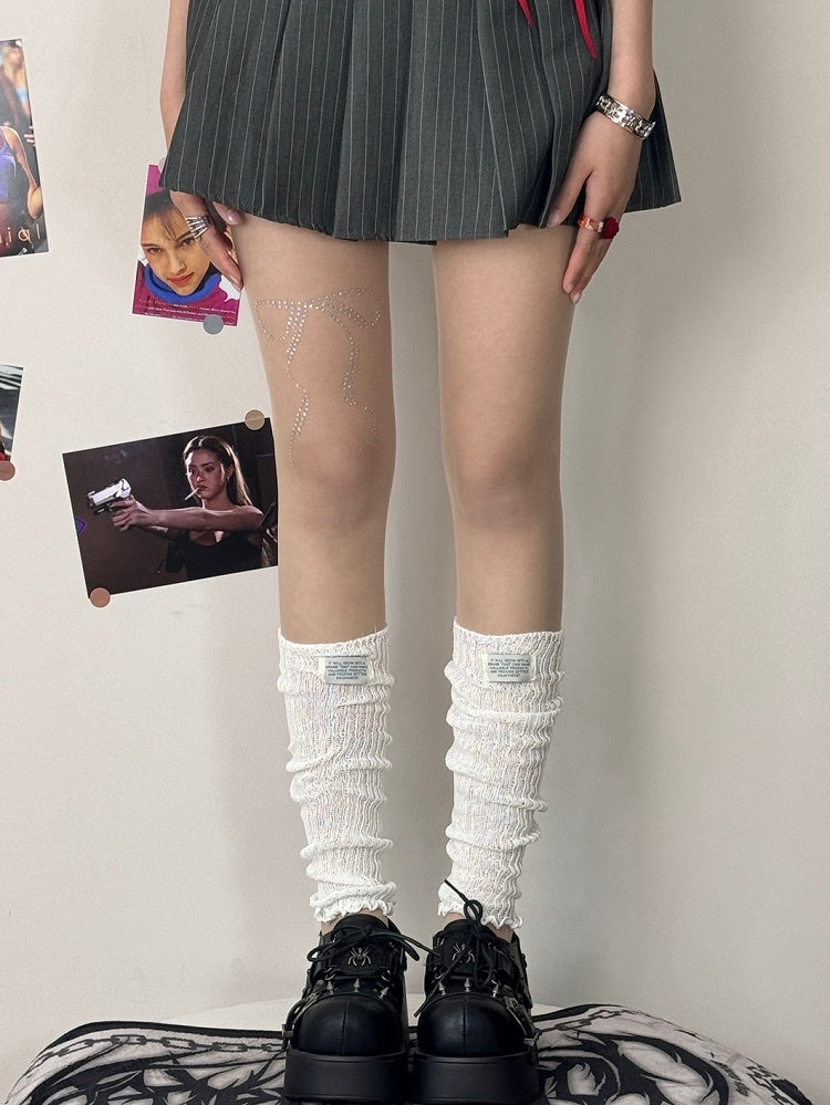 Verzierte Schleifenstrumpfhose mit Strasssteinen in Nude