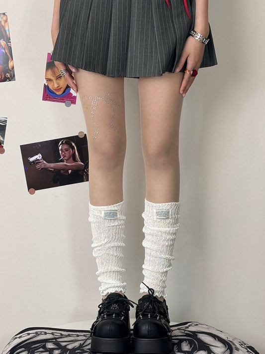 Verzierte Schleifenstrumpfhose mit Strasssteinen in Nude