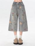 Light Gray Cropped Denim Jeans with Embroidered Bear & Distressed Design