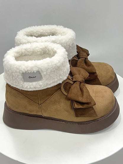 Braune Winter-Ugg-Stiefel mit Hasenohren und Schleife