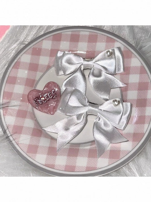 2-Color Bow Hairclip with Heart Decoration - IVONA boutique