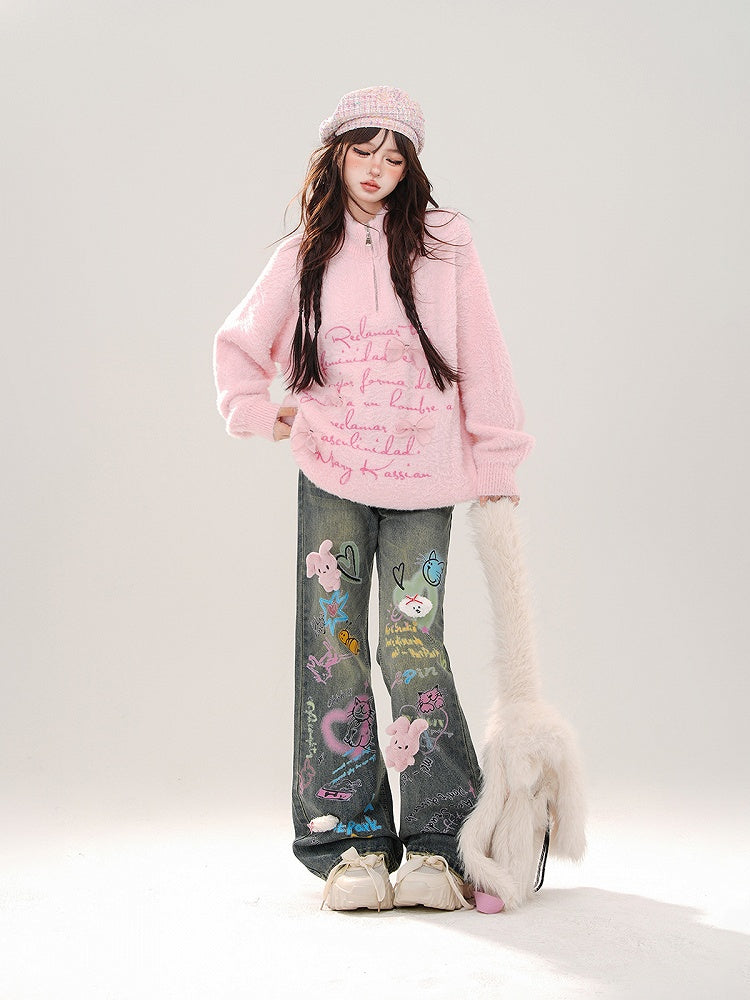 Jeans mit weitem Bein, buntem Graffiti und abnehmbarem rosa Plüschhasen in Blau
