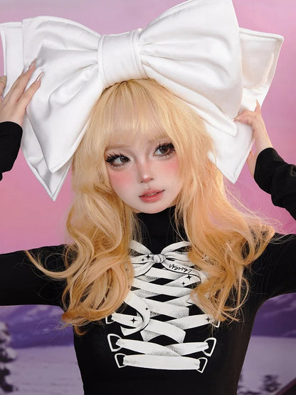 Schwarzes, langärmliges Top mit Schleife und Schnürung