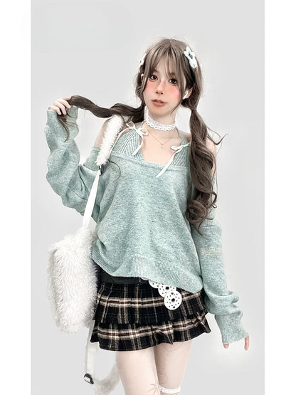 ミントグリーンのホルターネックフェイクツーピースニットセーター