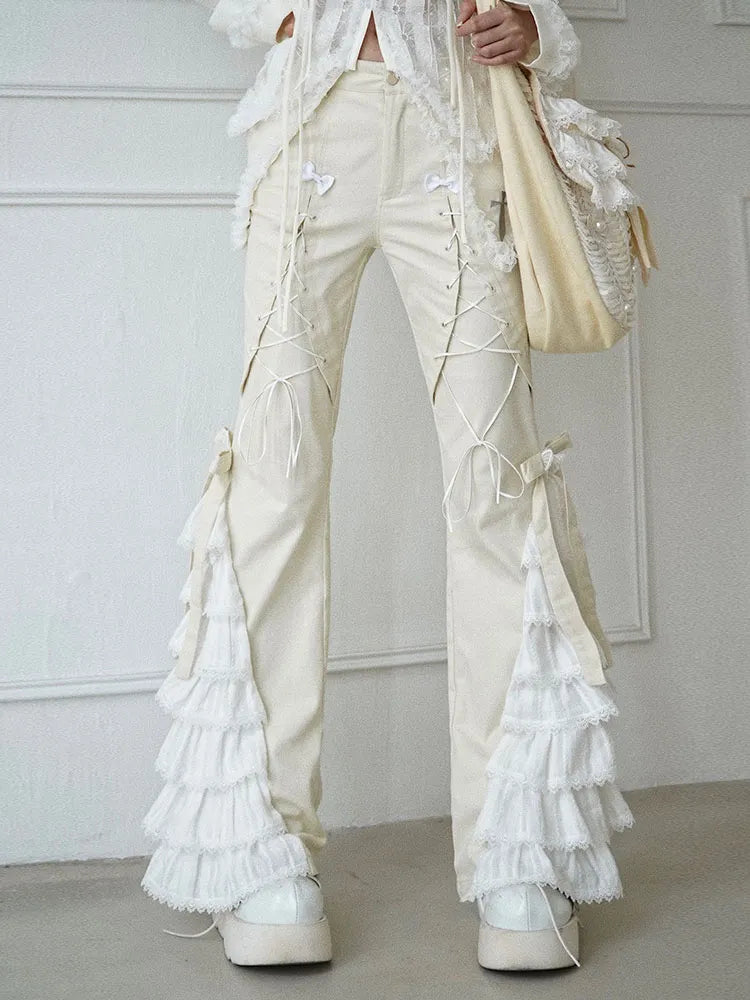 パンツデザイン：ベージュ、ティアードフレアディテール、バタフライ、レースアップ、リボン結び