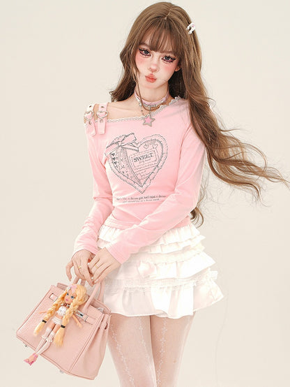 Rosa Top mit Herzschnallenträgern und asymmetrischem Ausschnitt