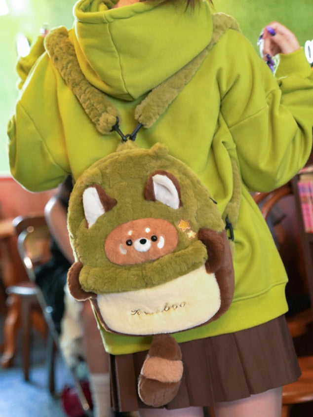 緑と茶色のかわいいレッサーパンダのぬいぐるみバックパック