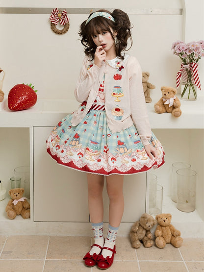 Aprikosenfarbene Strickjacke mit langen Ärmeln und Dessert-Print