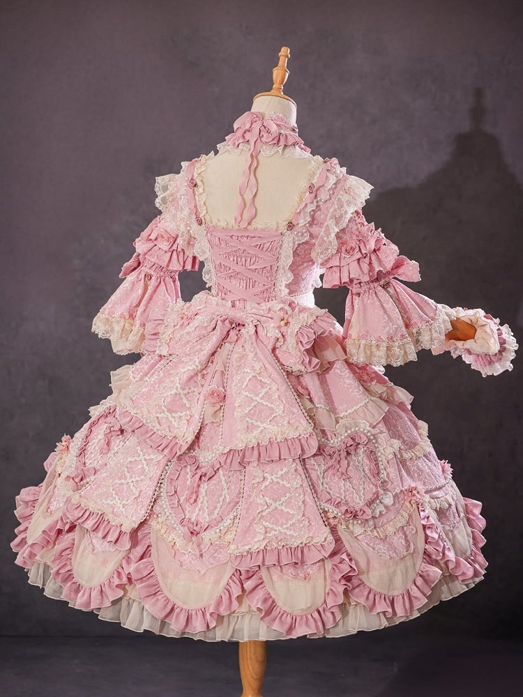 Robe Lolita Hanayome rose magnifique avec broderie florale et détails de chaîne de perles