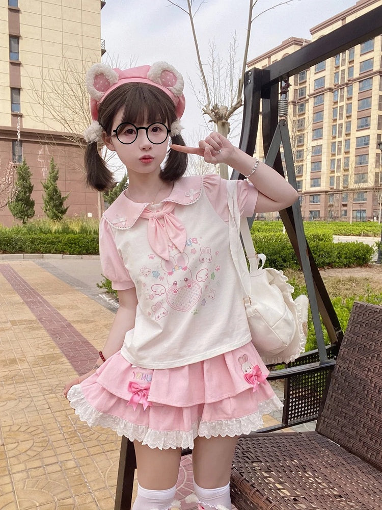 Spitzenbesatz, rosa Schleife, Stufenrock-Akzente