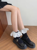 Socken mit floralem weißem Muster, Wadenbesatz und schwarz-weißer Spitze