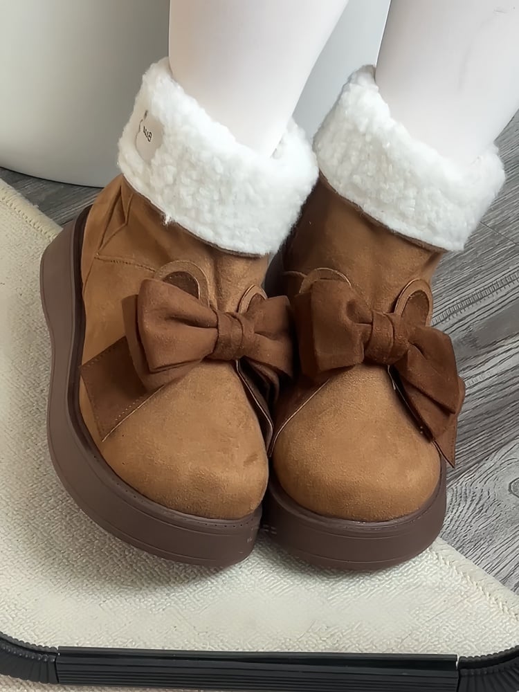 Braune Winter-Ugg-Stiefel mit Hasenohren und Schleife