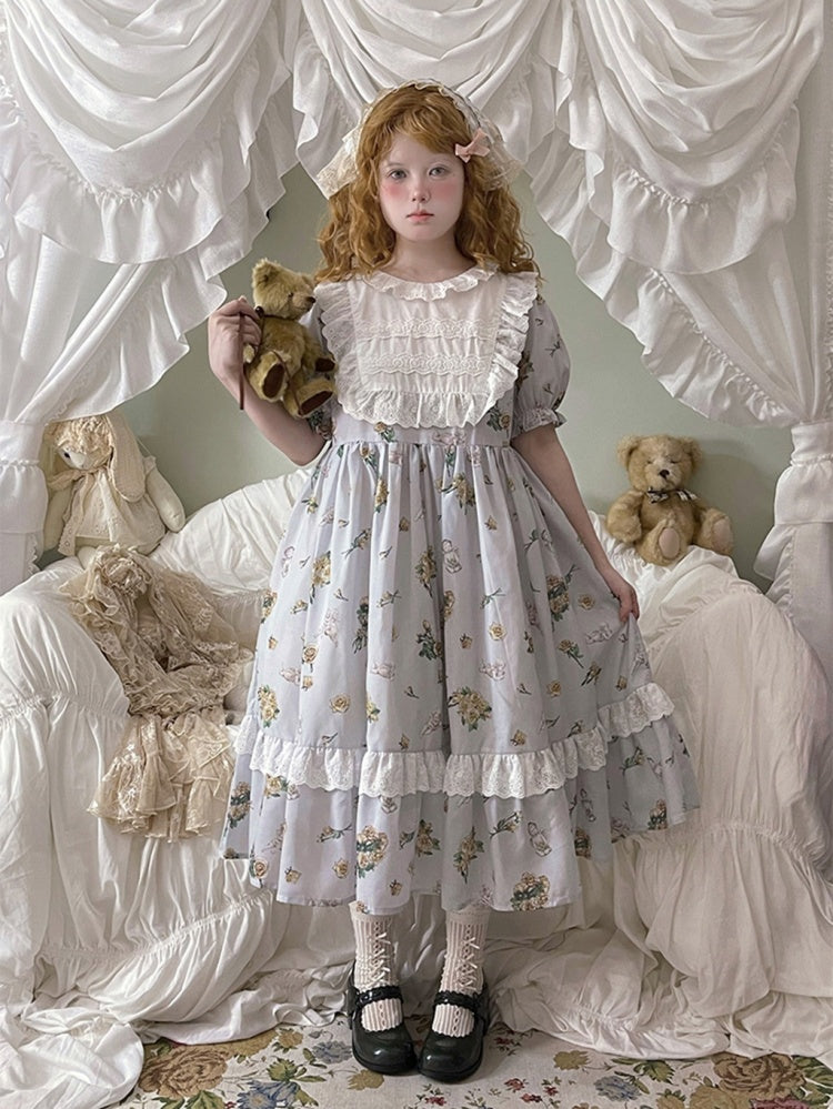 Rosa Hauskleid mit Puffärmeln und Blumendruck