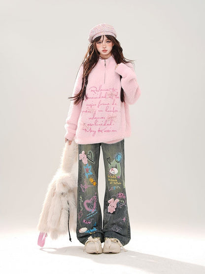 Jeans mit weitem Bein, buntem Graffiti und abnehmbarem rosa Plüschhasen in Blau