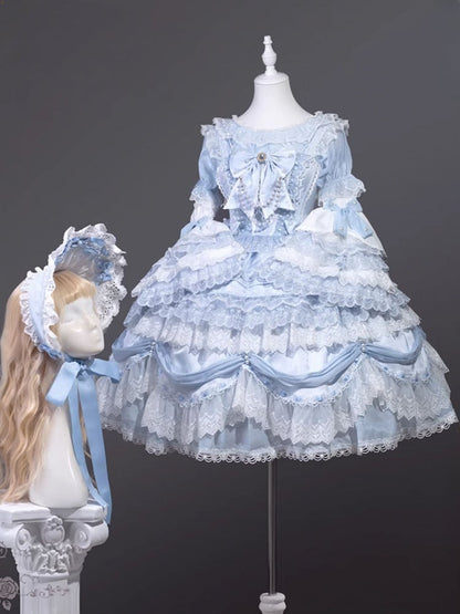 ライトブルーのショートパフスリーブシフォンブラウス