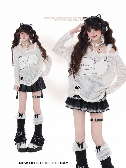 Beiges, halbtransparentes Top mit asymmetrischem Ausschnitt und Katzen-Applikation