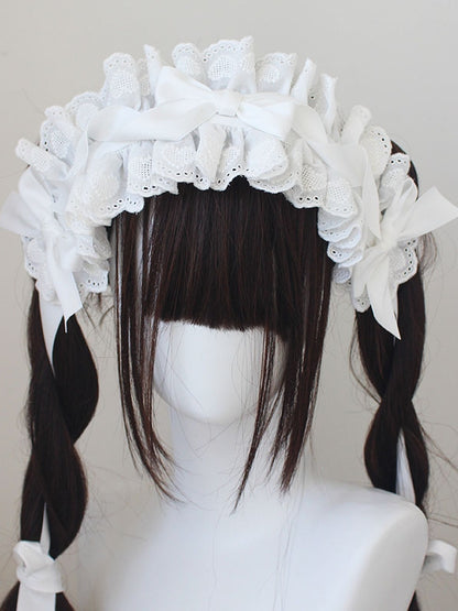 コットンレーストリムの蝶結びディテールハイバンド