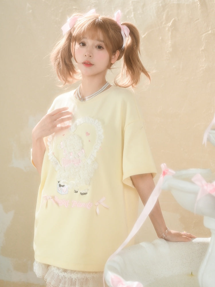 イエローのプラッシュラムアップリケフリルハートルーズTシャツクリーミー