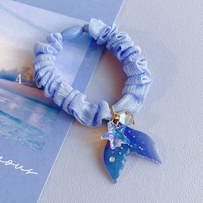 Perlenbesetzter 7 Meerjungfrau Charm Optionen Blaues Haargummi verziert