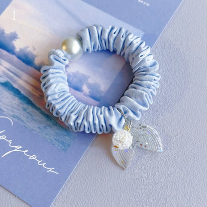 Perlenbesetzter 7 Meerjungfrau Charm Optionen Blaues Haargummi verziert