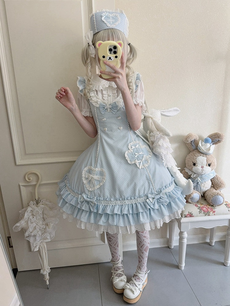 Blaues Lolita-Kleid mit Rüschensaum und Lagenmuster und Polka-Dot-Muster