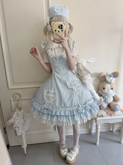 Blaues Lolita-Kleid mit Rüschensaum und Lagenmuster und Polka-Dot-Muster