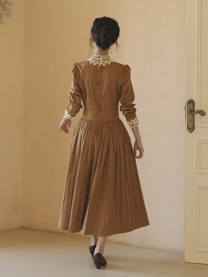 Braunes Vintage-Kleid mit Stehkragen und langen Puffärmeln