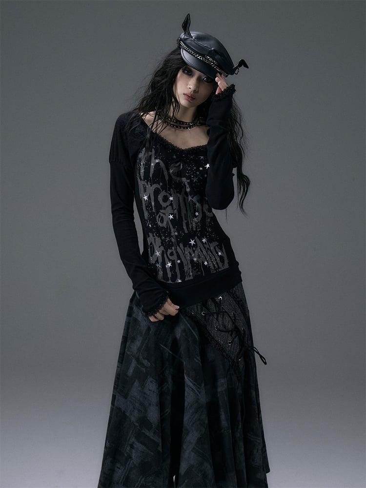 Schwarzes Top mit V-Ausschnitt und schimmernder Sternspitze