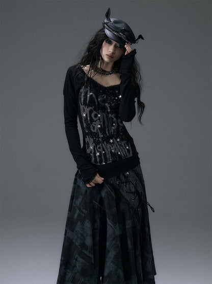 Schwarzes Top mit V-Ausschnitt und schimmernder Sternspitze