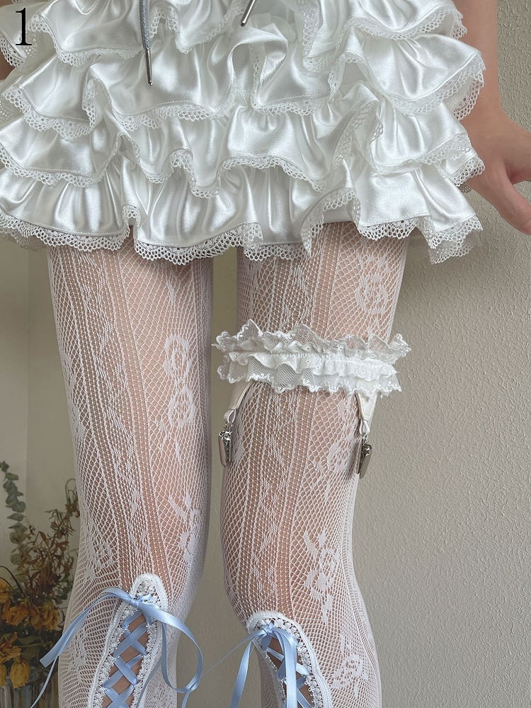 花柄タイツ ブルー くり抜き柄 レースアップディテール