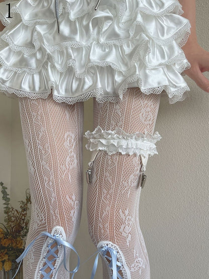 花柄タイツ ブルー くり抜き柄 レースアップディテール