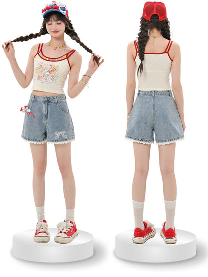 Blaue Jeansshorts mit Schleifenstickerei an den Bündchen und Spitzenbesatz