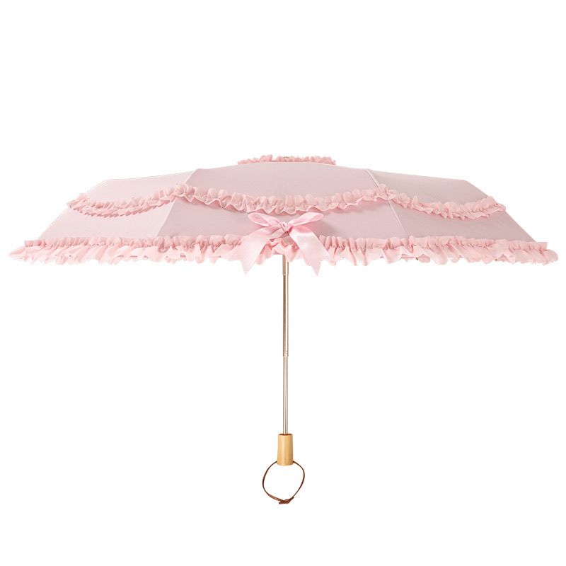 Open pink three-fold Lolita umbrella with layered ruffle lace and wooden handle