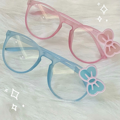 ゆめかわいいブルー/ピンクのリボンフレームメガネ