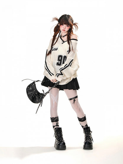 Schwarz/weißes, asymmetrisches Oberteil mit Sonnenschutz und Hohlsaum