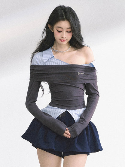 グレーとブルーのストライプ柄のツーピース、アシンメトリーネックラインのフェイクトップス