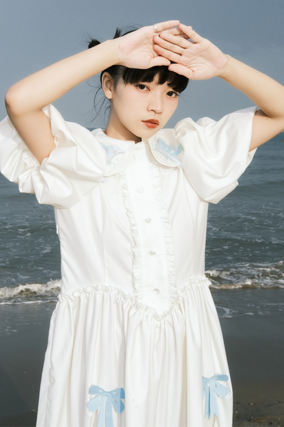 Prinzessinnenkleid mit Ballonärmeln und Schleife