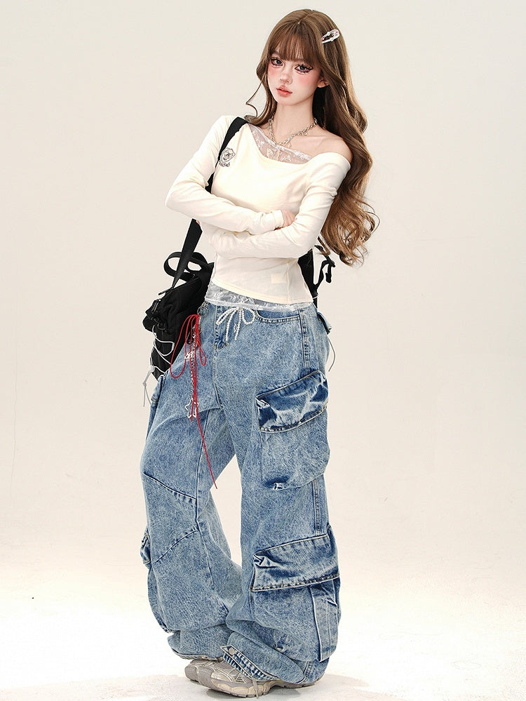 Aprikose/königsblaues, schmal geschnittenes Oberteil mit Spitzenakzenten und asymmetrischem Ausschnitt