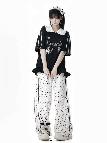 Weiße Baumwollhose mit geradem Bein und Punktemuster und Panda-Plüschtier