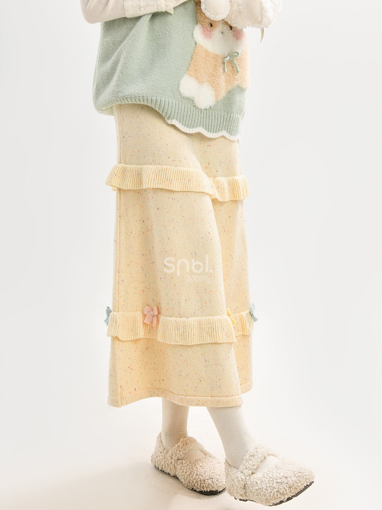 イエローのリボンがアクセントのハイウエストニットミディ丈スカート