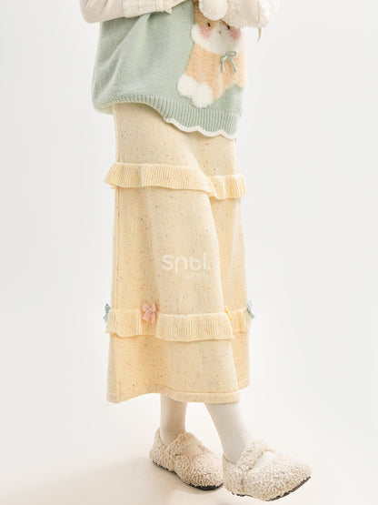 イエローのリボンがアクセントのハイウエストニットミディ丈スカート