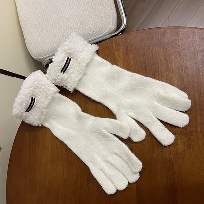 Schwarz/Weiße Plüschhandschuhe