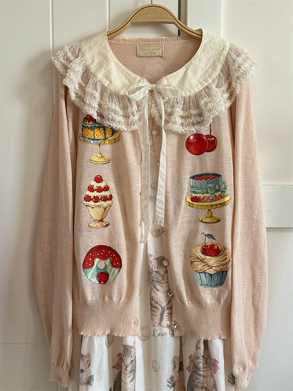 Aprikosenfarbene Strickjacke mit langen Ärmeln und Dessert-Print