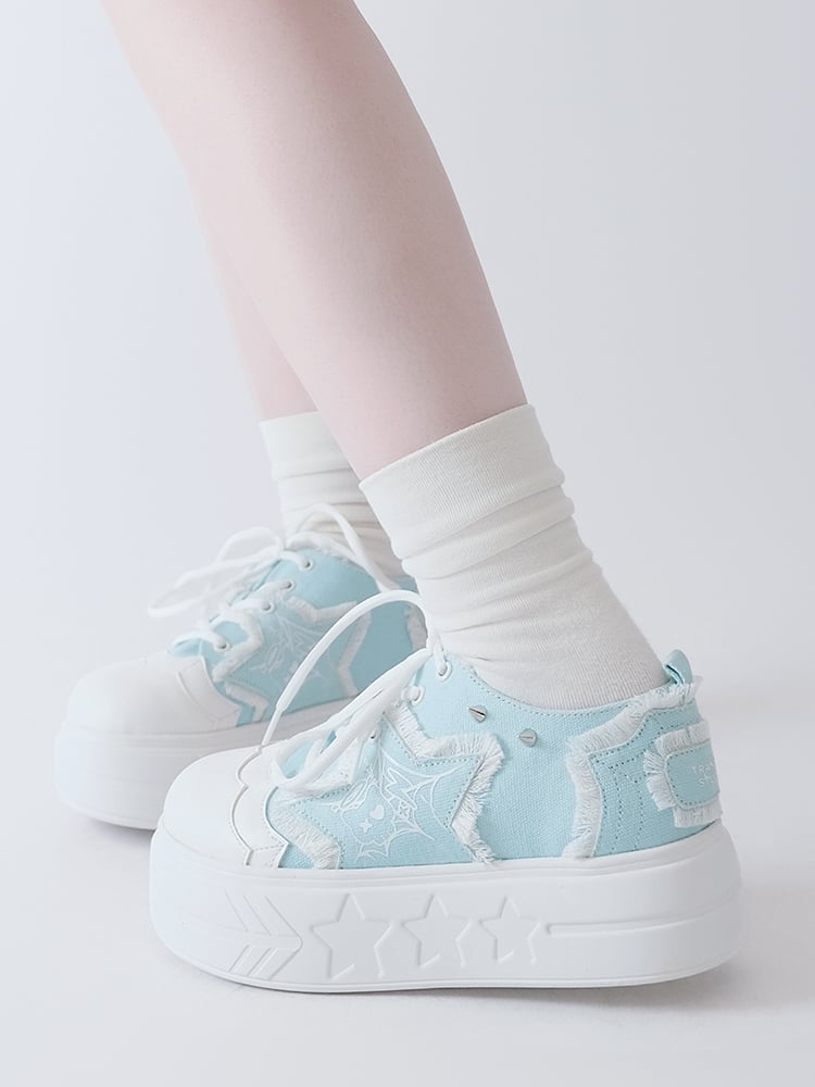 Blaue Plateau-Sneaker mit Stern-Applikation