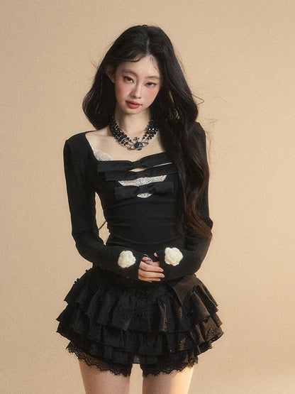 Spitzenaufnäher, glamouröse Details, kontrastierende weiße Schleifen, V-Ausschnitt, schwarzes Strickoberteil