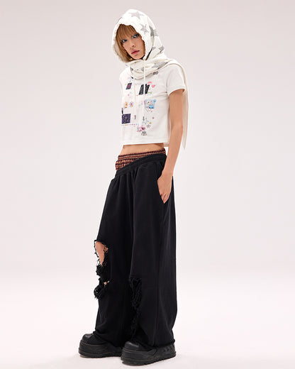 Schwarz/weiße Mütze und Schal mit Stern-Strasssteinen in einem