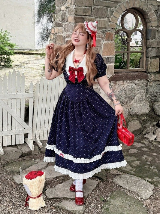Robe trapèze bleu foncé à pois avec nœud rouge et dentelle - Hard Candy